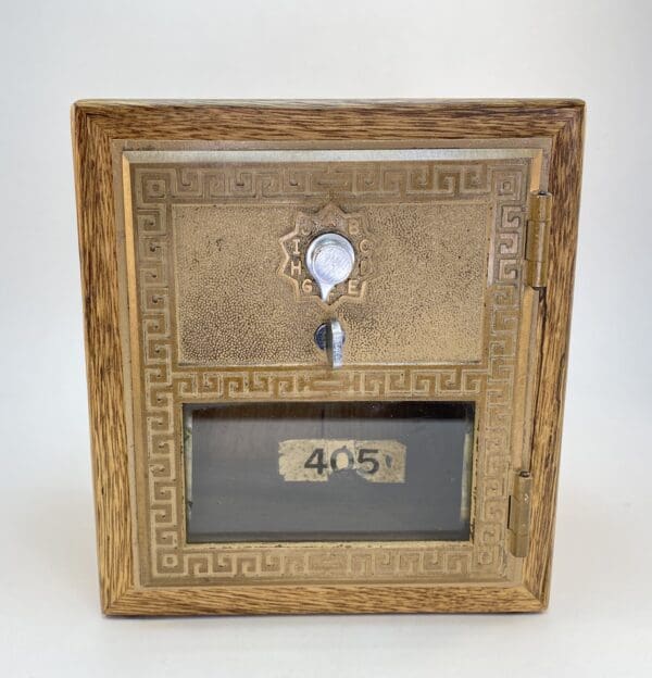 Antique wooden box with brass details.