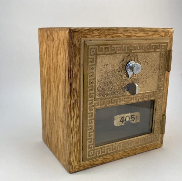 Antique wooden box with a keylock.