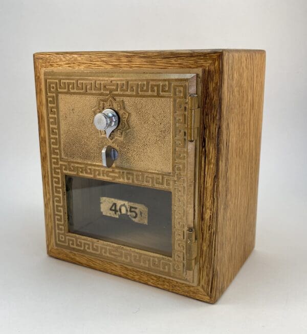 Vintage wooden box with metal lock.