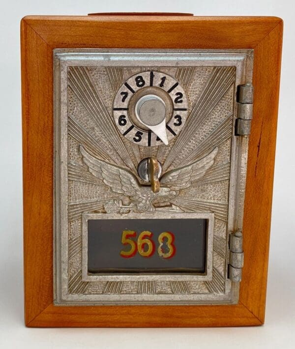 A picture frame with a clock and number on it.