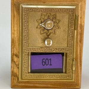 A wooden frame with a clock and a purple sign.