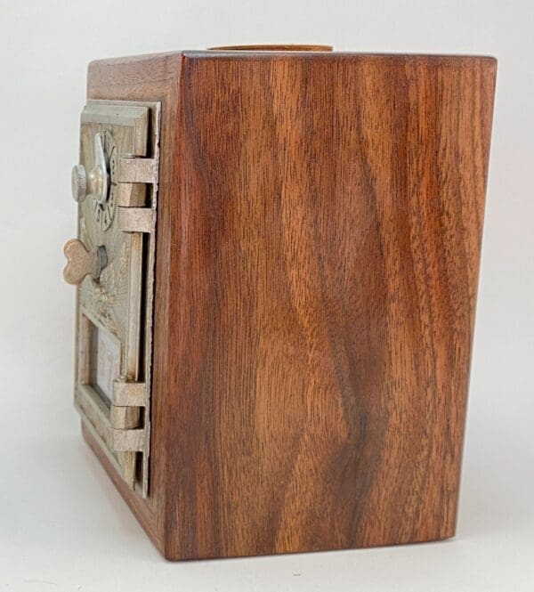 A wooden box with many compartments on top of it.