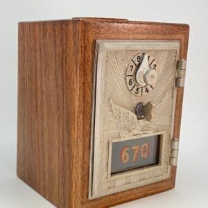 A wooden box with a clock and numbers on it.