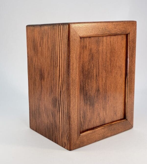 Wooden box with a grain pattern.