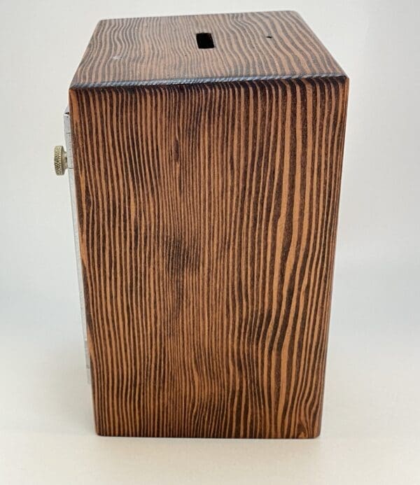 Wooden box with grain pattern.