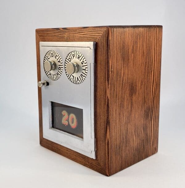 Wooden box with combination lock and number 20.