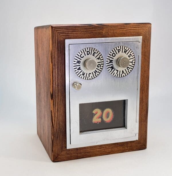 Wooden safe box with number dials.