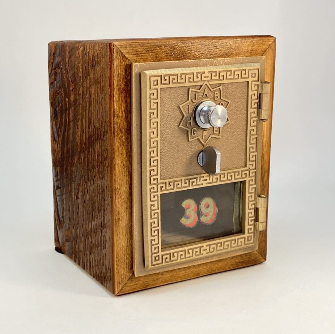 Vintage wooden mailbox with number 39.