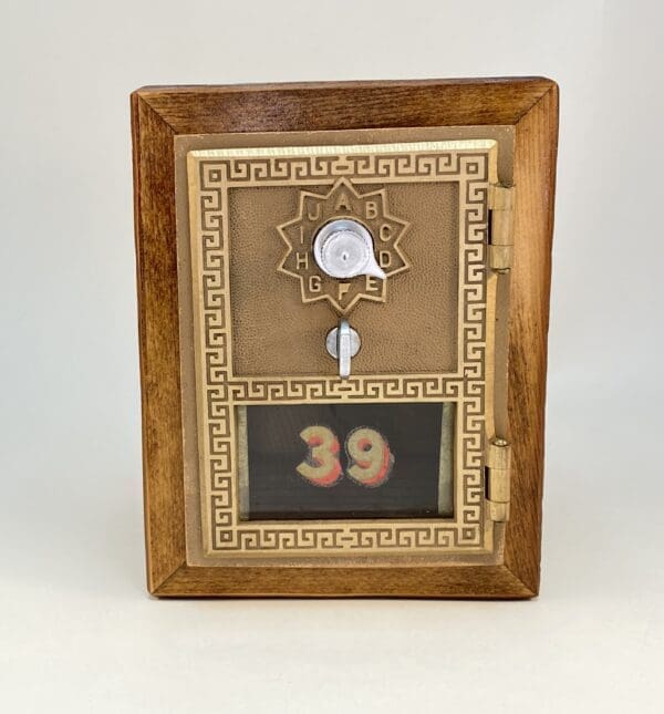 Antique wooden framed mailbox with number 39.