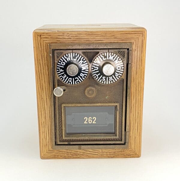 Vintage box with rotary dials and number display.