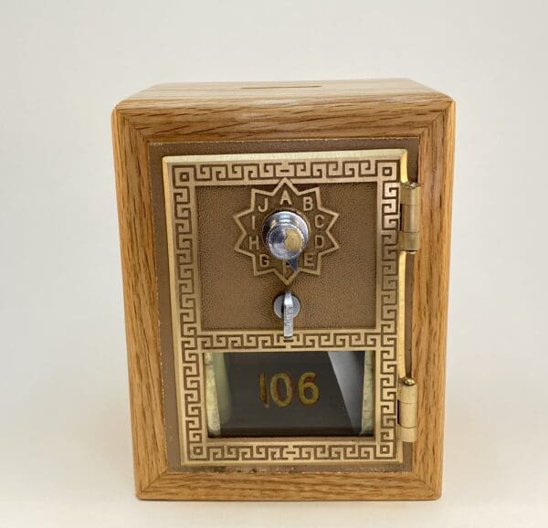 Vintage wooden locked box with keyhole.