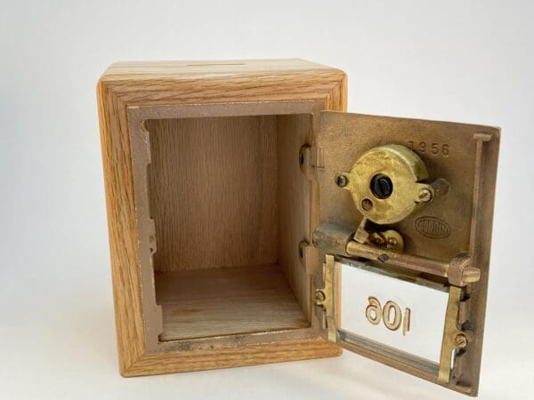 Vintage wooden box with metal lock.