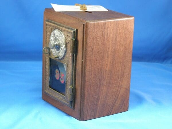 A wooden box with a picture of two people in it.