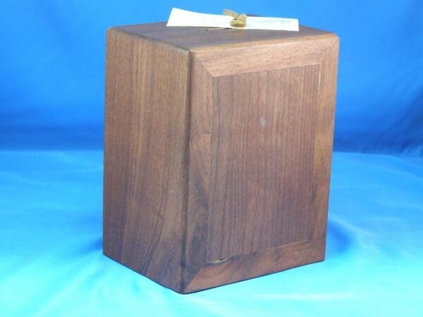 Wooden box with a blue background.