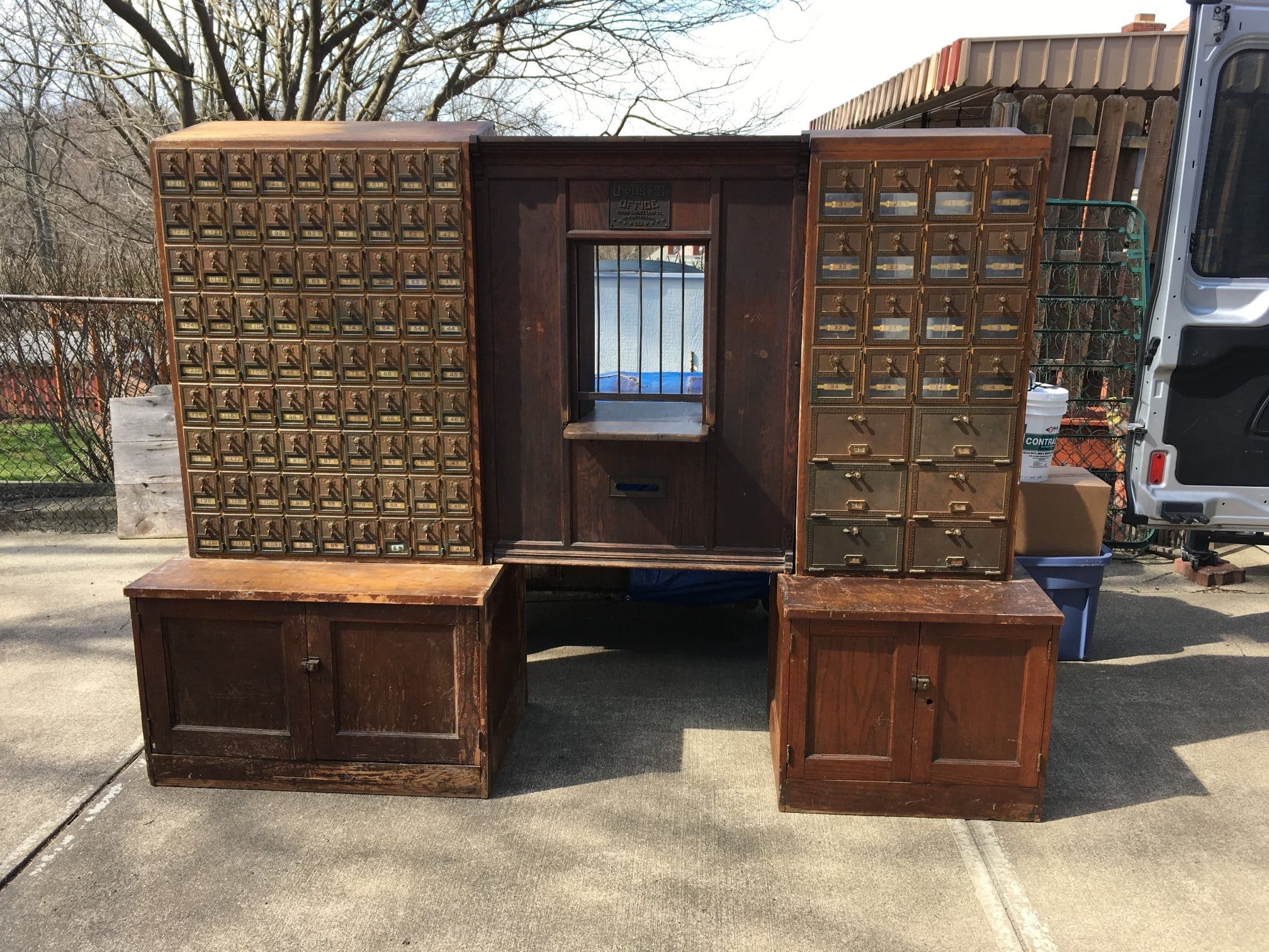 Antique wooden post office boxes.