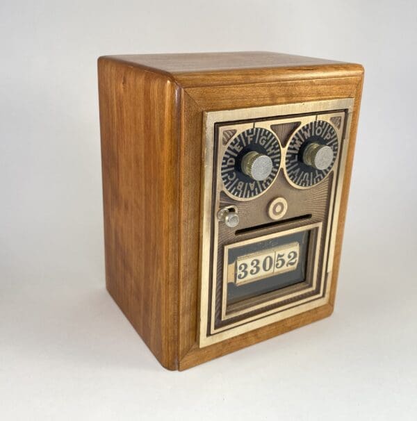 Vintage wooden mechanical counter or timer.