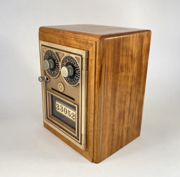 Antique wooden box with dials and display.