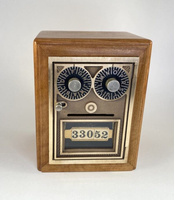 Vintage bank with dials and numeric display.