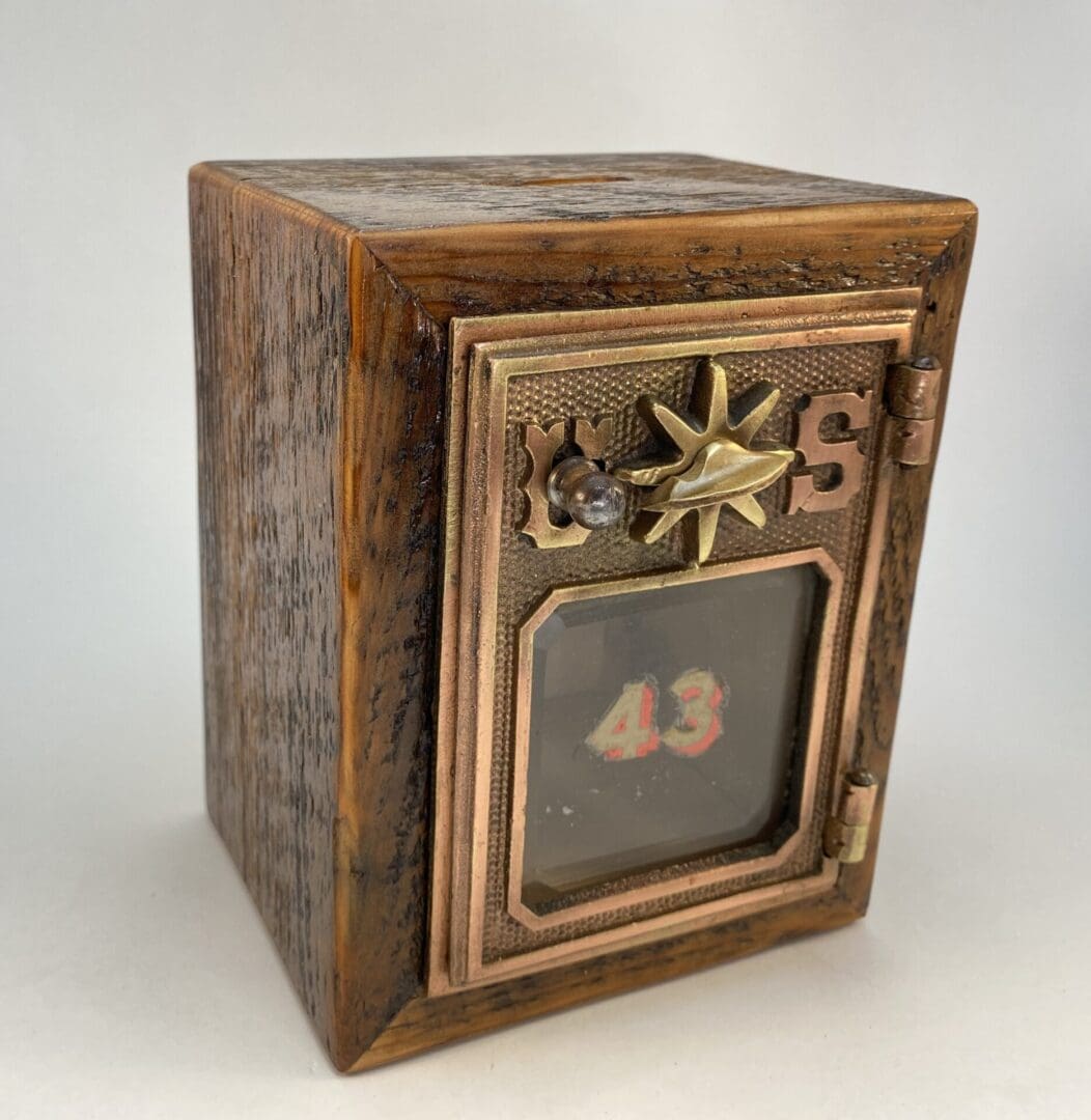 Vintage wooden box with glass front.