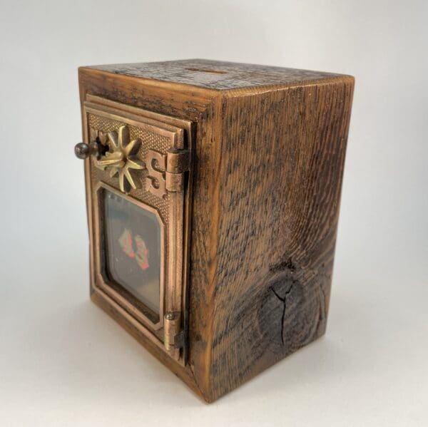 Vintage wooden box with metal accents.