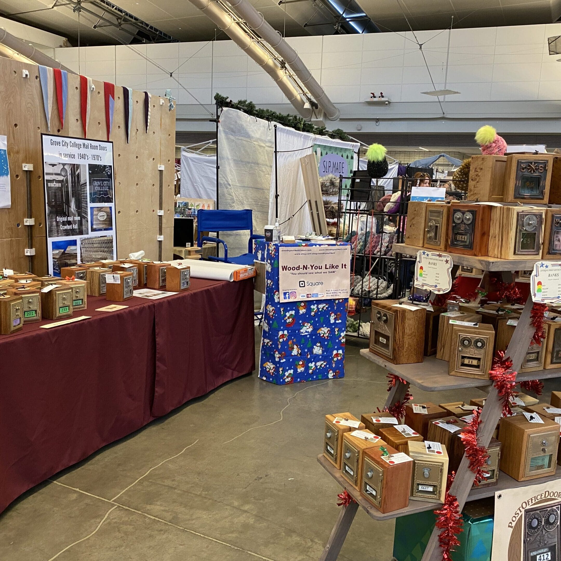 A room filled with boxes and tables of items.